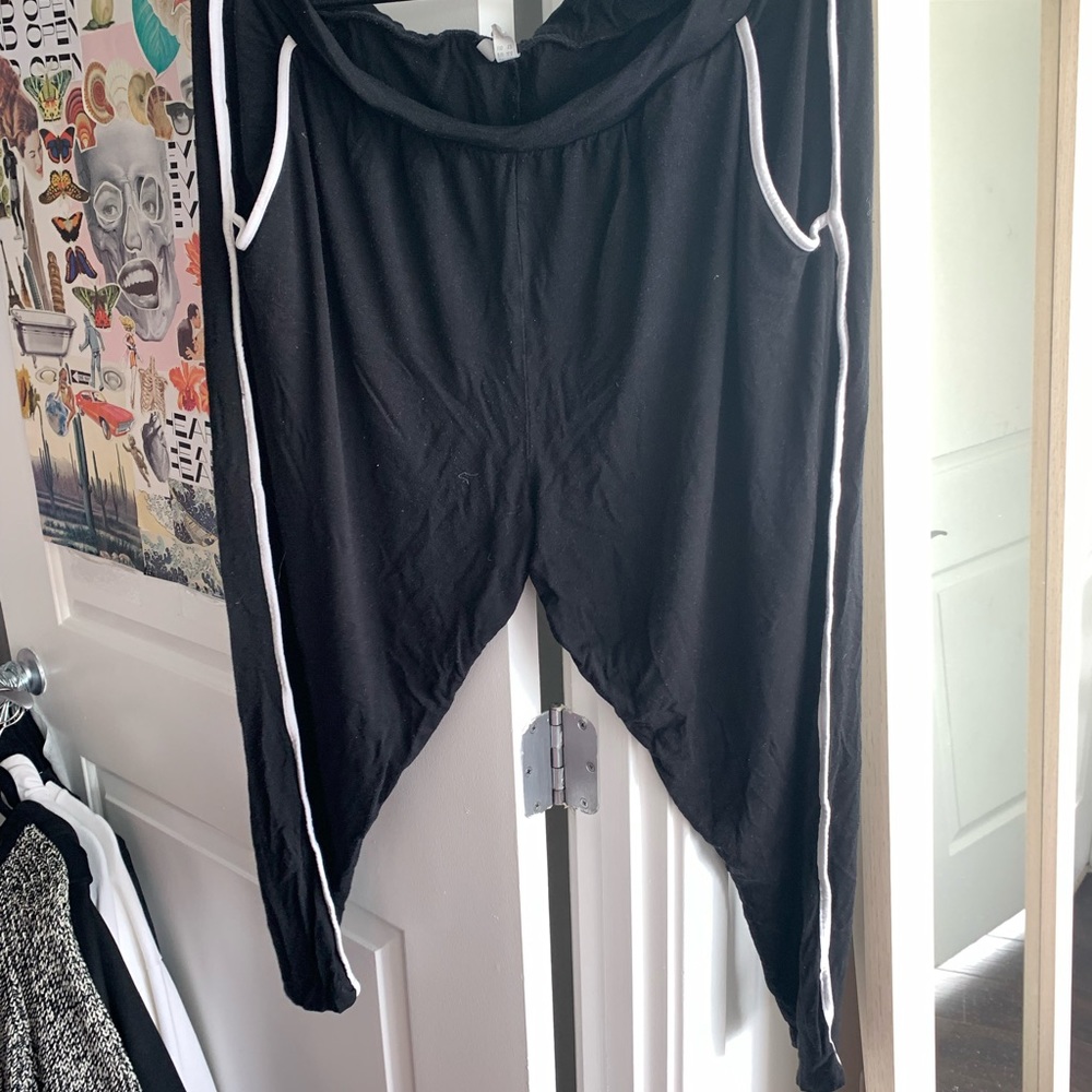Black joggers with white side stripe